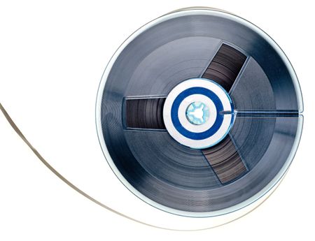 Vintage reel of audio tape on white backgroundの写真素材