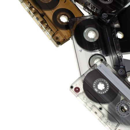 Heap of Compact Cassettes on white background