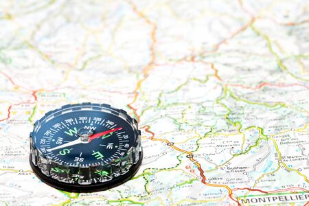 Navigation with compass and map, shallow focusの写真素材