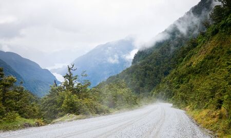 Gravel road at Fiordland National Park, New Zealandの写真素材
