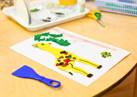 Children's applique work art items on a tableの写真素材