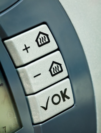 Residential gas boiler digital thermostat control panel buttonsの写真素材