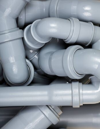 Grey PVC sewer pipes  background