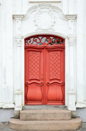 Old ornate wooden door in Norwayの写真素材
