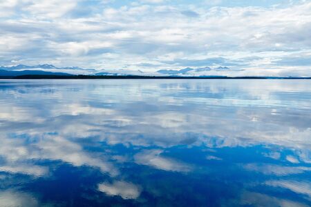 Clouds reflected in still waters of Moldefjord in Norwayの写真素材