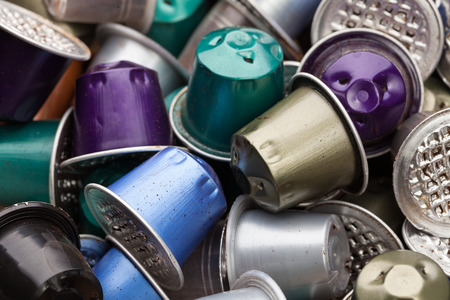 Dumped plastic and metal espresso coffee capsules environmental issueのeditorial素材