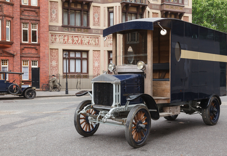 LONDON, UK - JUNE 17, 2013: a retro movie scene with old-timer cars on a streetのeditorial素材