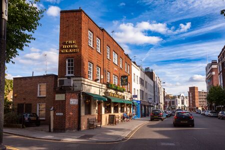 LONDON, UK - JUNE 17, 2013: Narrow building of historic The Hour Glass Pub on Brompton Road,...