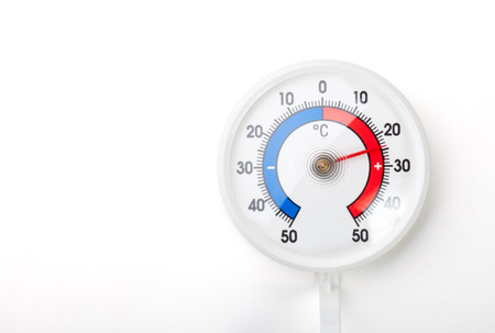 Thermometer with celsius scale showing comfortable room temperature â plus twenty four degreeの写真素材