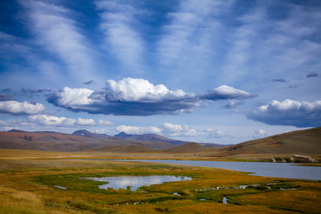 Unforested mountain valley in Western Mongolia Altay Mountains at summerの写真素材