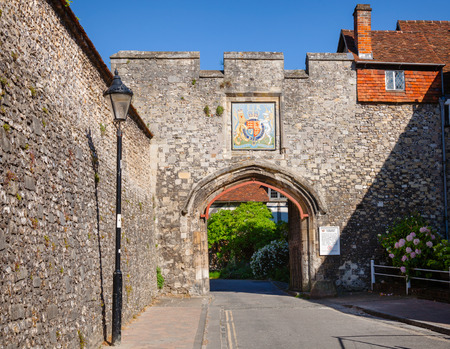 Priory Gate entrance to Winchester Cathedral featuring City Coat of Arms and parking restriction notice, Hampshire, South East England, UKのeditorial素材