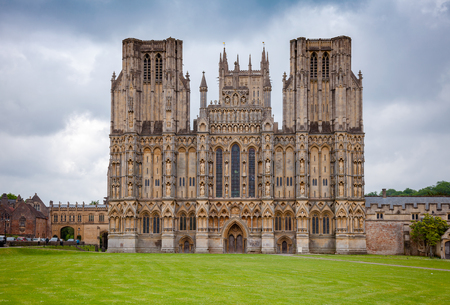 West front of anglican Wells Cathedral (Cathedral Church of Saint Andrew), Somerset, South West England, UKの写真素材