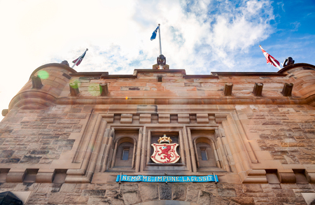 Edinburgh Castle Gatehouse entrance facade with the Lion Rampant crest and latin motto of the Royal Stuart dynasty of Scotlandのeditorial素材