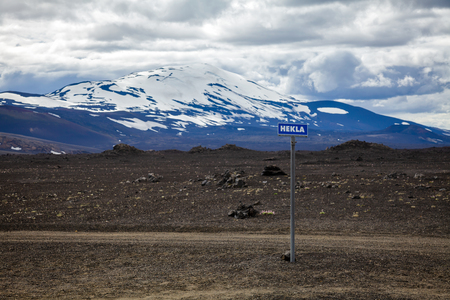 Hekla road sign with volcano in background. Hekla (Hecla) is one of Icelands most active volcanoes and a popular tourist attraction in Southwestern Iceland, Scandinaviaの写真素材