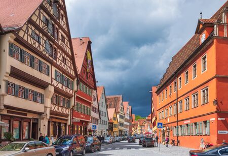 Dinkelsbuhl, Germany - May 11, 2019: Colorful houses at along touristic Segringer Streetのeditorial素材