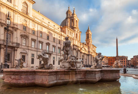 Piazza Navona, a historic public open space and significant example of Baroque Roman architecture in Rome with Fontana del Moro (Moor Fountain) in foreground and Fontana dei Quattro Fiumi (Fountain of the Four Rivers) in backgroundのeditorial素材