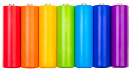 Vibrant and energetic colorful AA alkaline batteries (Mignons) pack showcases a spectrum of hues isolated on white backgroundの写真素材