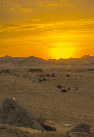 Sunrises in Saudiarabia, beautiful orange sky with mountain and desertの写真素材
