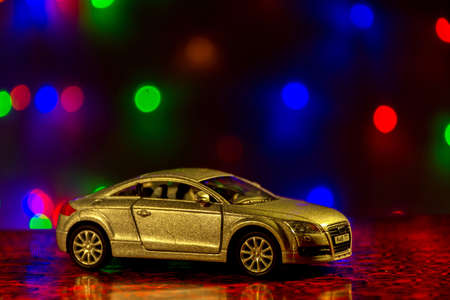 Toy car and bokeh light background