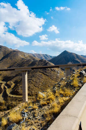 Beautiful road with bridge and mountain background, beautiful cloudy sky, Banisad, Saudi arabiaの写真素材