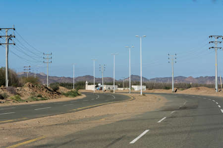 bueatiful curved road With clear sky and hills, Located in Khulais, Saudi arabiaの写真素材