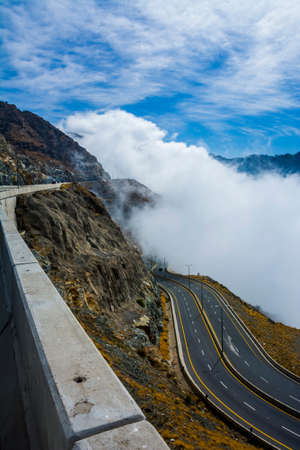 Taif zigzag road in a cloudy day, Taif - Saudi arabiaの写真素材