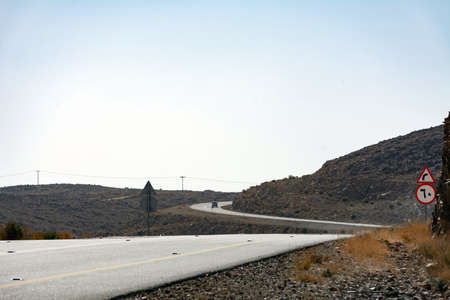 Beautiful road with mountain background, beautiful clear sky, Banisad, Saudi arabiaの写真素材