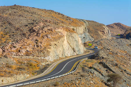 Beautiful road with mountain background, beautiful clear sky, Banisad, Saudi arabiaの写真素材