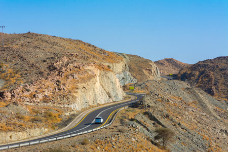 Beautiful road with mountain background, beautiful clear sky, Banisad, Saudi arabiaの写真素材