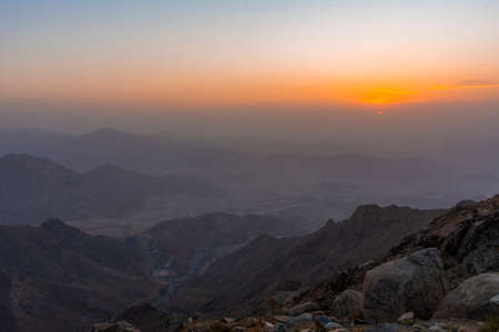 Beautiful mountain sunset with dramatic clouds, Located in Taif, Saudi arabiaの写真素材