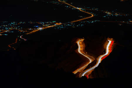 Traffic light trials night photography, zig zag road Al Hada, Taif - Saudi arabiaの写真素材