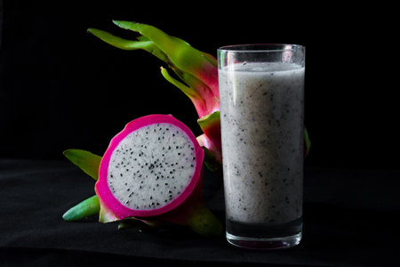 Dragon fruit,Juice isolated with black backgroundの写真素材
