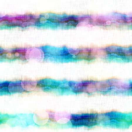 Seamless seventies tie dye stripe bokeh texture. Hippie summer wavy striped repeat background with ink dyed effect.の写真素材