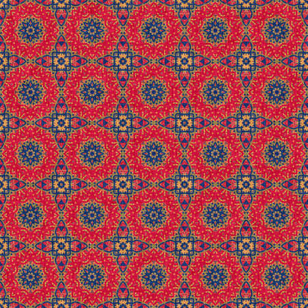 Indian boho summer bandana seamless symmetrical pattern. Versatile masculine red blue scarf print in kaleidoscopic floral ornamental style.の写真素材