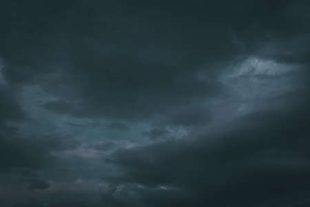 picture of thunderstorm clouds starting to pour rain and lightning.