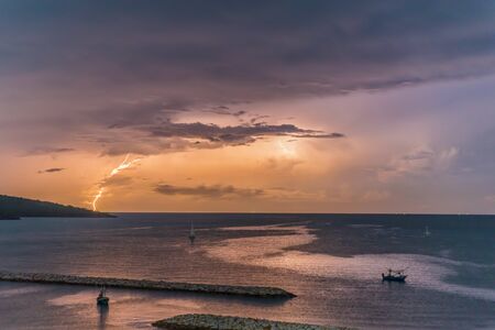 Lightning in the ocean of Thilandの写真素材