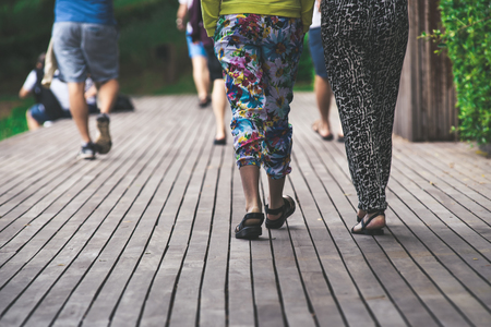 Women walking in the boardwalkの写真素材