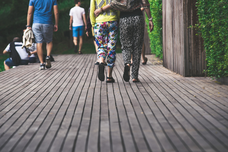 Women walking in the boardwalkの写真素材