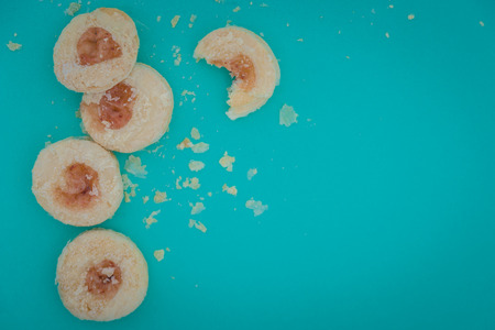 Strawberry jam cookies on blue backgroundsの写真素材