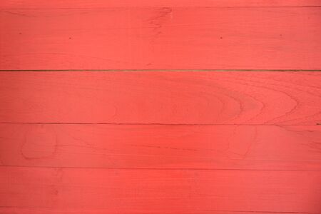 Red wooden background and texture.