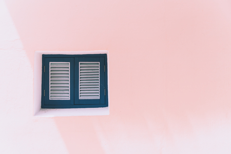 Vintage windows on the pink wallの写真素材
