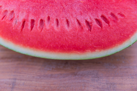Watermelon slices on the wooden tableの写真素材