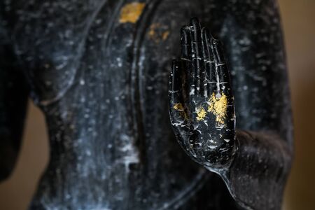Black Hand of Buddha selective focusの写真素材