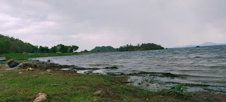 Landscape of the lake and the mountain with cloudy sky background.のeditorial素材
