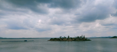 Landscape of the island in the sea with a cloudy sky.のeditorial素材