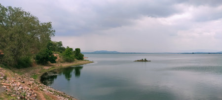 Panoramic view of the lake on a cloudy day in the summerのeditorial素材