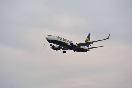 TURIN - October 27, 2015 - Ryanair Airplane landing at Turin Airportのeditorial素材