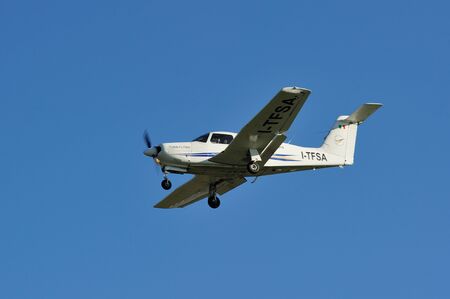 TURIN - November 07, 2015 - The Turin Flying ITFSA airplane landing at Turin Airportのeditorial素材