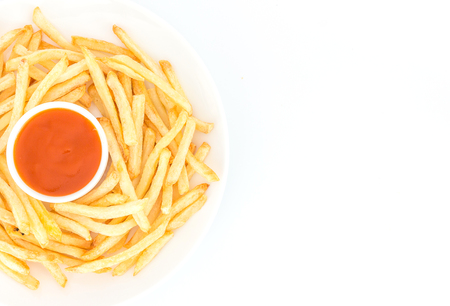 French fries with ketchup on plate. Top view with copy spaceの写真素材