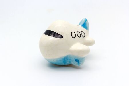 white and blue porcelain cute airplane model isolated over a white background, Decorative and toy